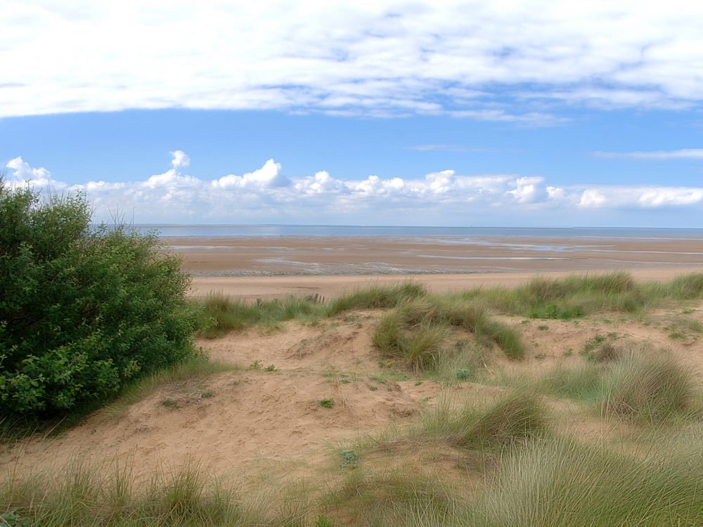 Panoramic shot of cloudy blue skies over Old Hunstanton Beach.