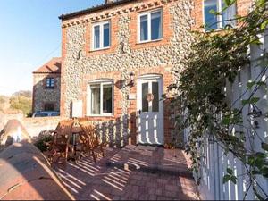 The exterior of Bluebell Cottage in west Norfolk.