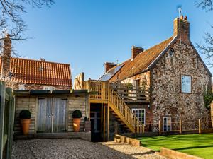 The exterior of Bluebell Cottage in west Norfolk.