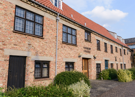 A daytime shot of King's Lynn Minster in the sunshine.