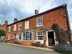 The exterior of Bluebell Cottage in west Norfolk.