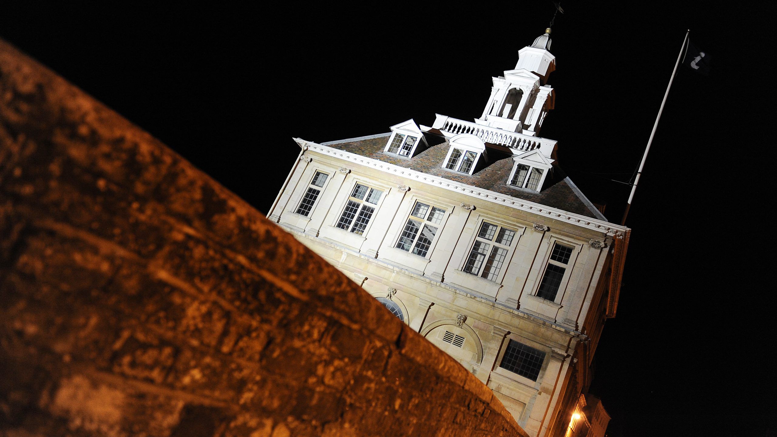 The Custom House lit up in the dark.
