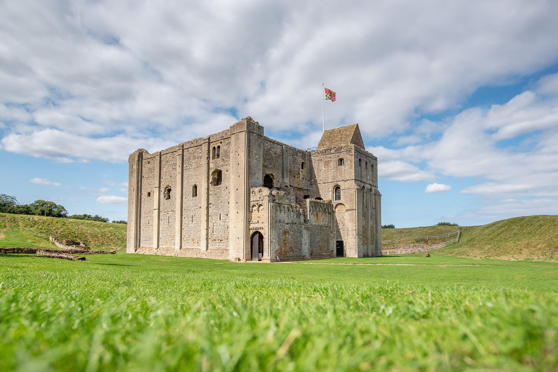 Castle Rising Castle standing tall within a moat in west Norfolk