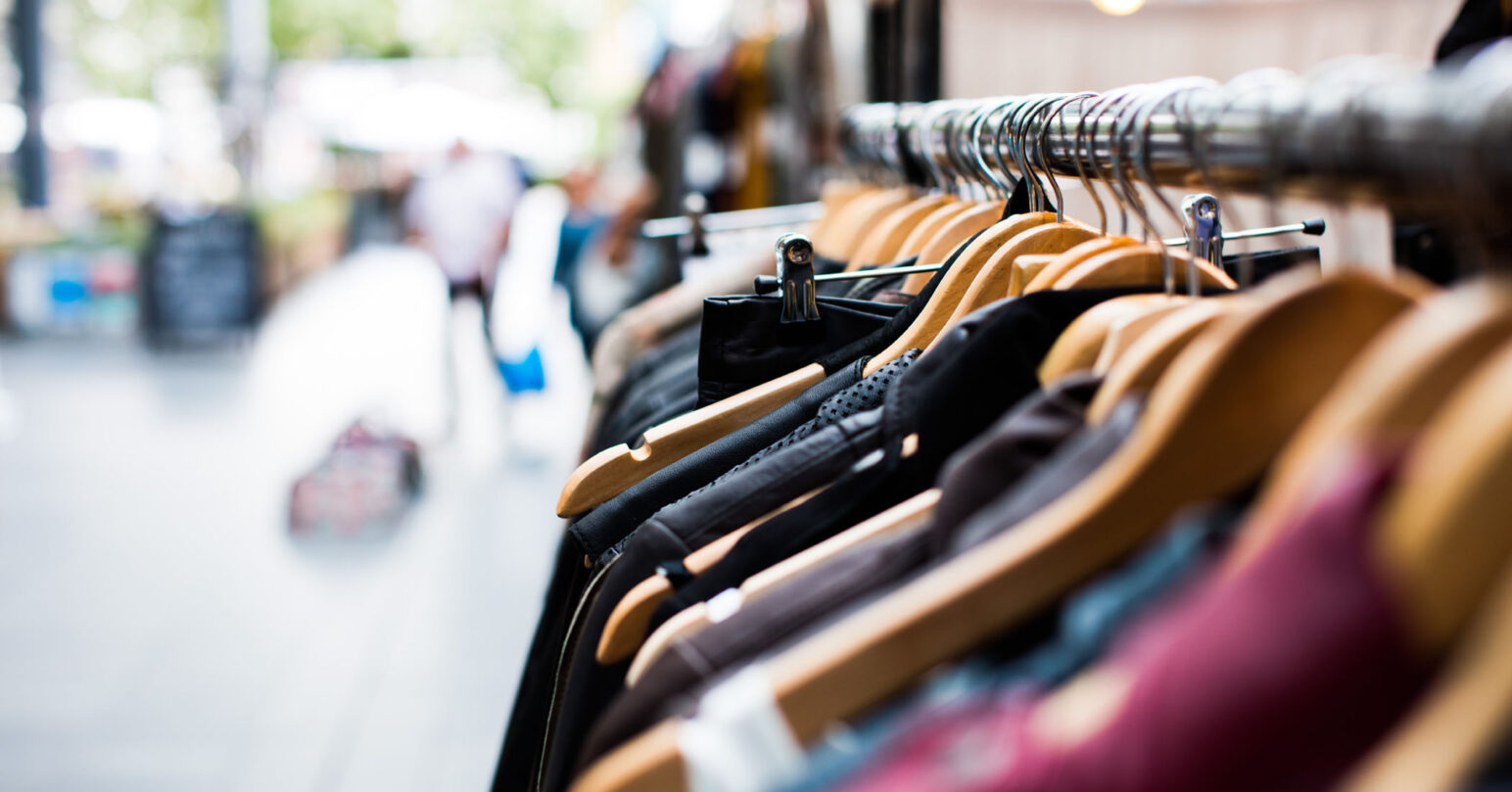 Second hand clothes on a clothing rack