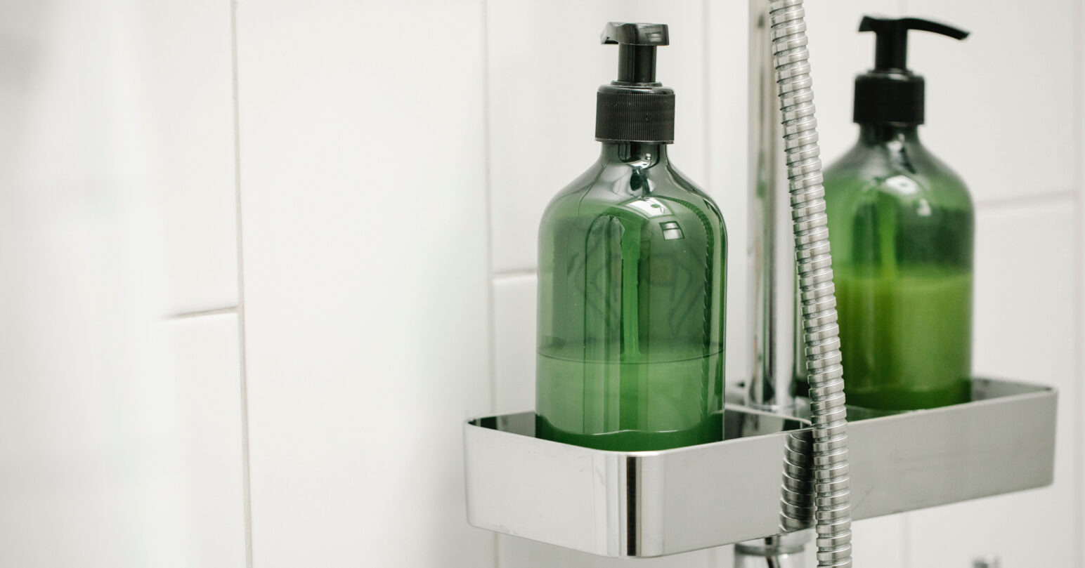 Refillable shampoo and conditioner dispensers