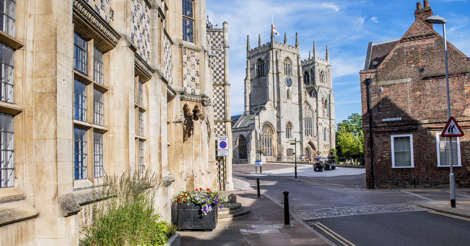 Saturday Market Place in King's Lynn with King's Lynn Town Hall and King's Lynn Minster