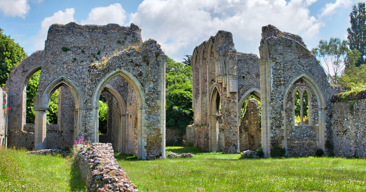 Flint-walled ruins of the Augustinian Creake Abbey church.