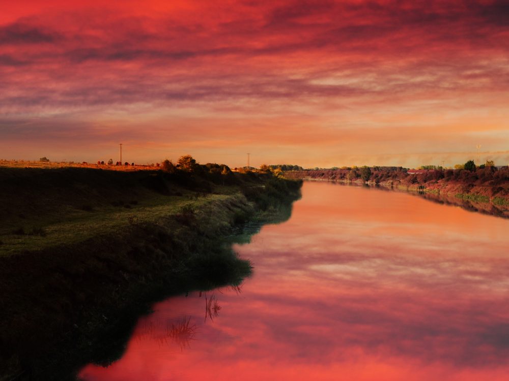 The sunset over King's Lynn reflecting on River Great Ouse,