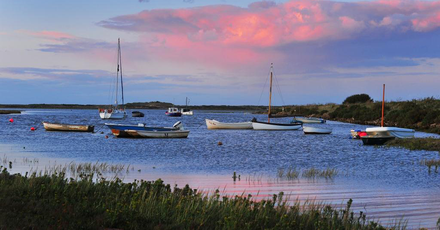 Sunset over Brancaster Staithe in West Norfolk.