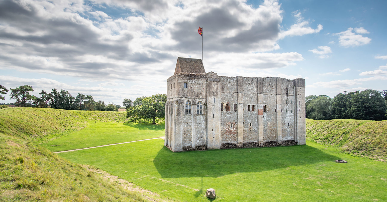 The exterior and surrounding earthworks at Castle Rising Castle in West Norfolk.