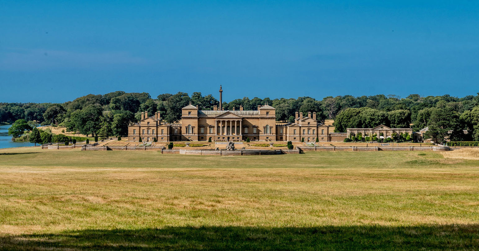 The exterior of the grand Holkham Hall and surrounding parkland in West Norfolk.