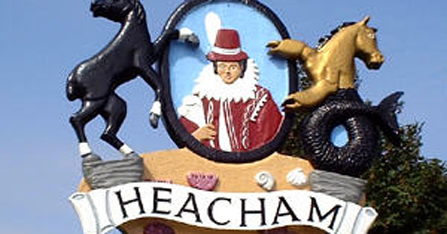 A figure depicting Pocahontas on the village sign for Heacham.