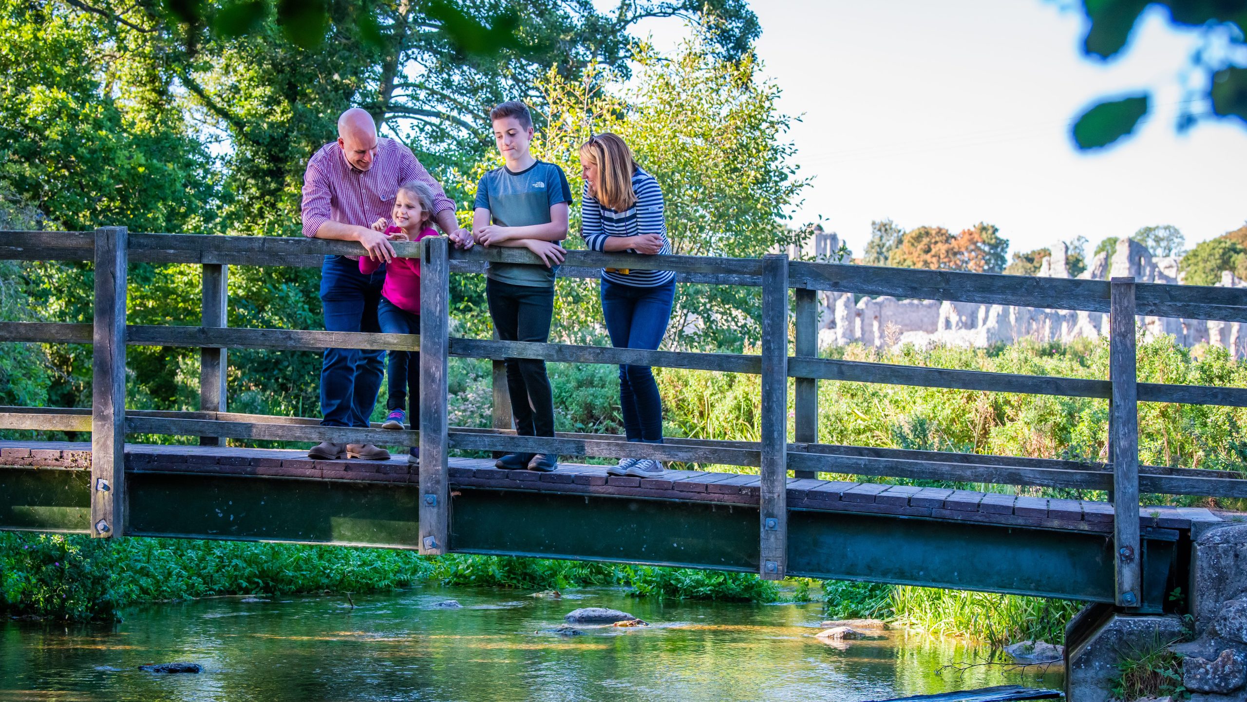 Castle Acre in the summer, countryside river, family