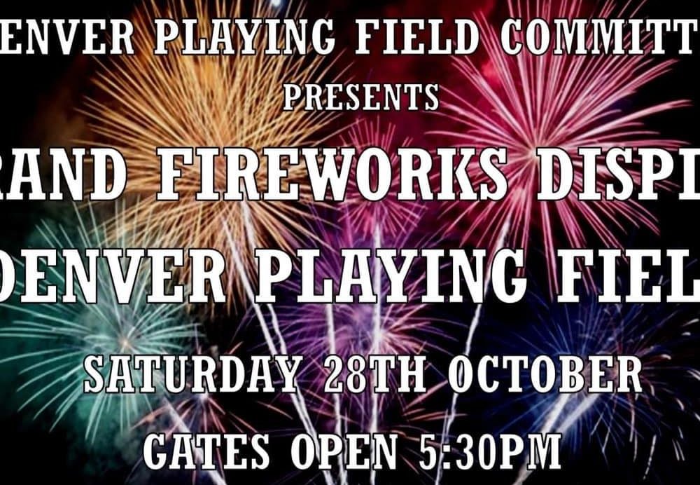 A child holding a large pumpkin at Oxburgh Estate, West Norfolk.